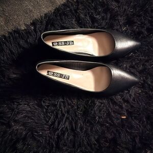 Black leather heels